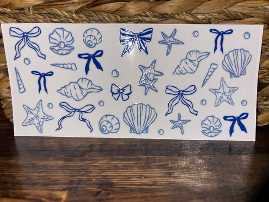 Dark blue bows and seashells
